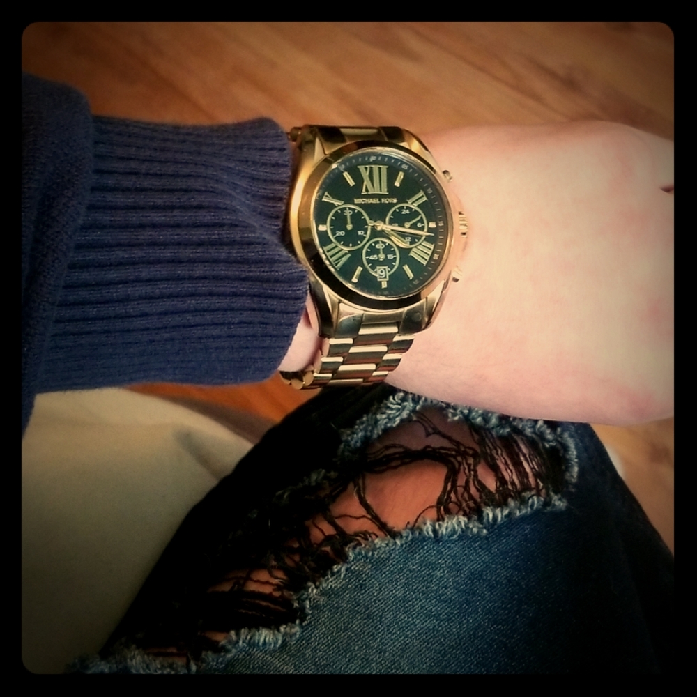 Mk watch 200 $